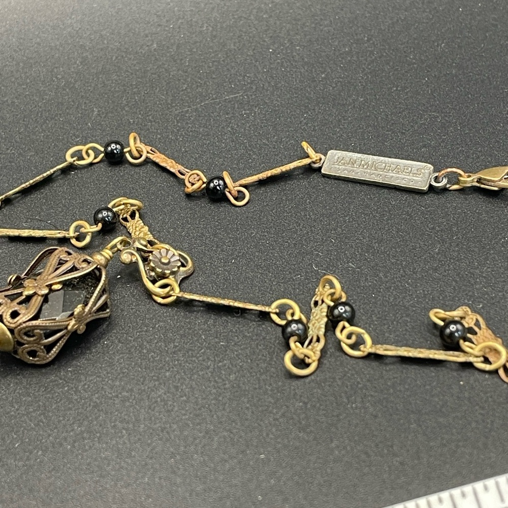 Elegant Black and Gold Pendant Necklace - Picture 11 of 12